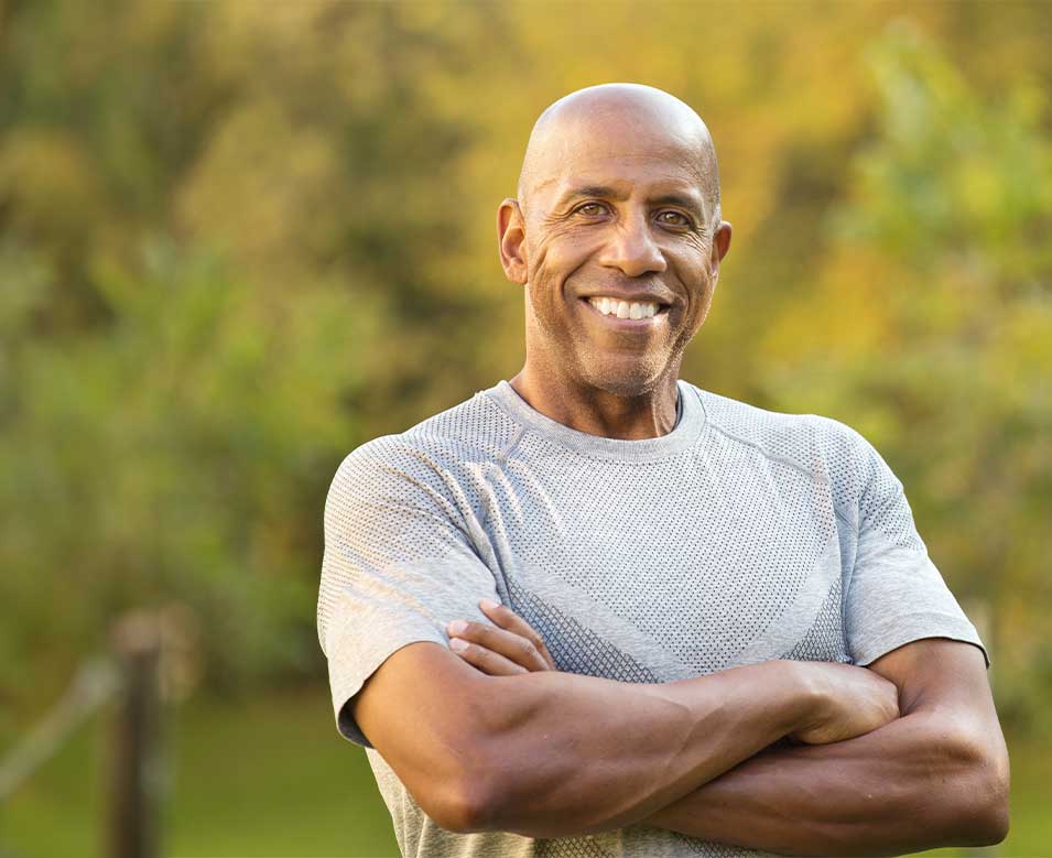 Man smiling after chiropractic adjustment