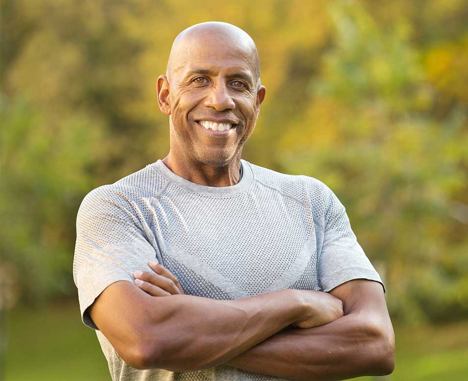 Man smiling after chiropractic adjustment